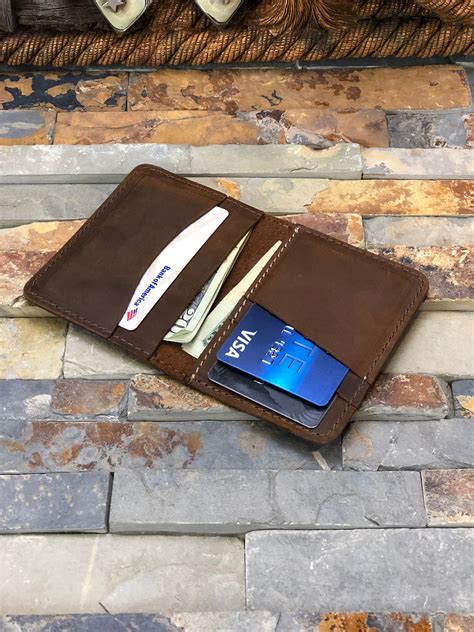 monogrammed wallet for him.